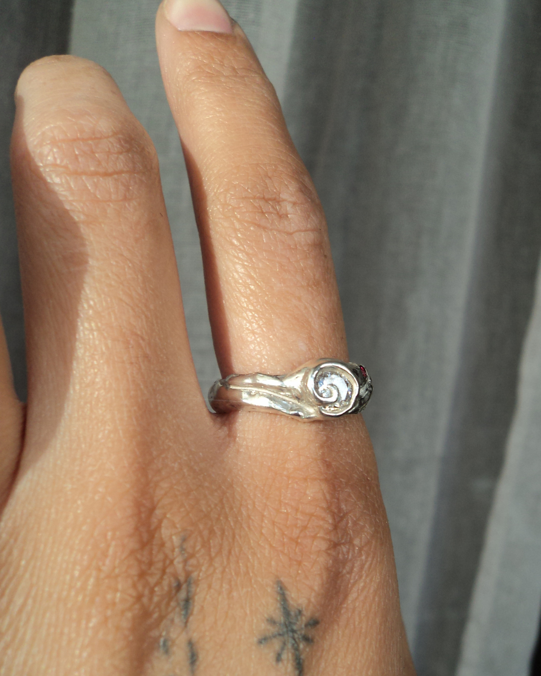 Ring with spiral